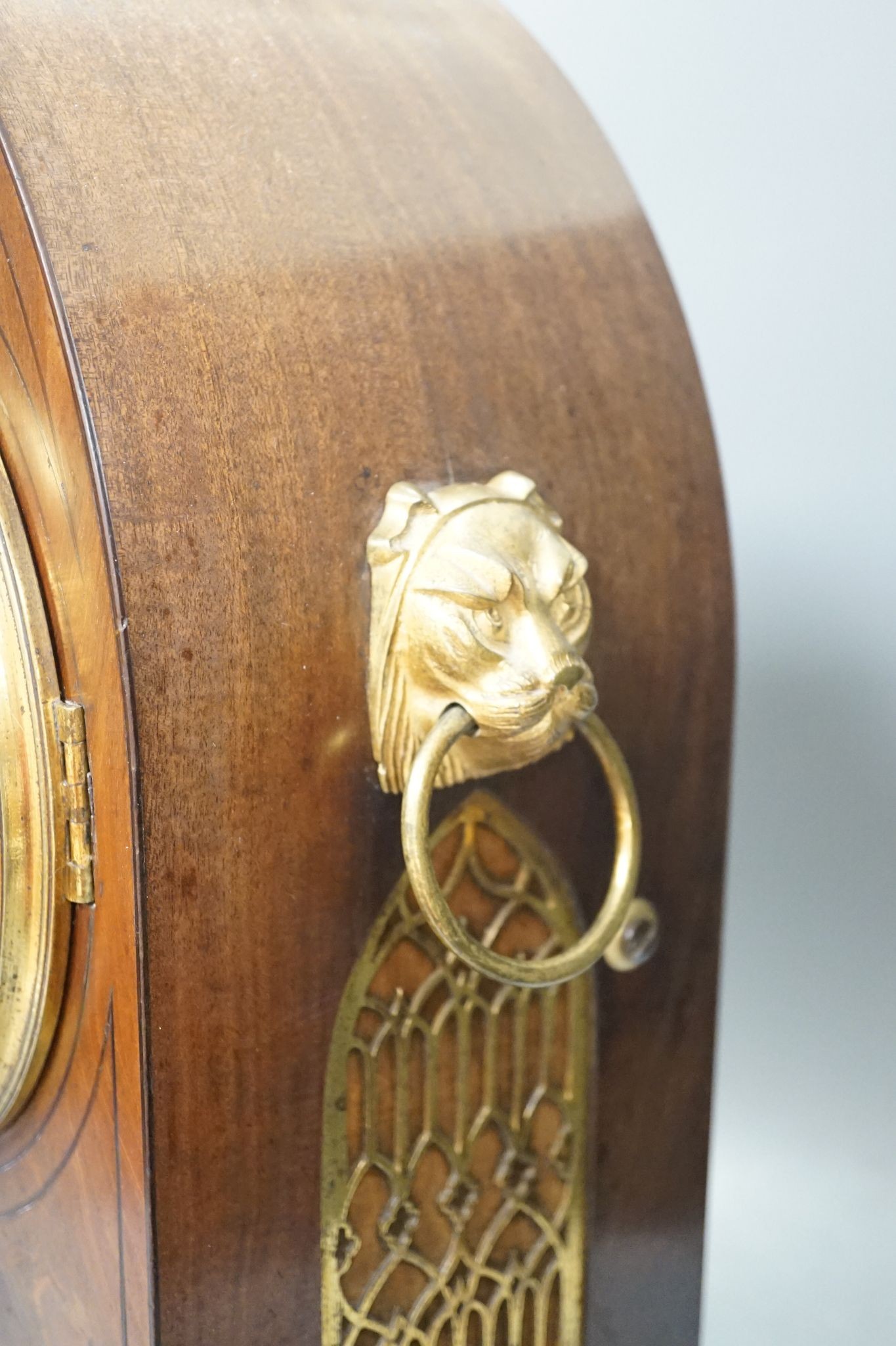 An early 19th century lancet shape mahogany mantel clock, 49cm